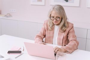 Woman on her laptop reviewing nonprofit email list tips